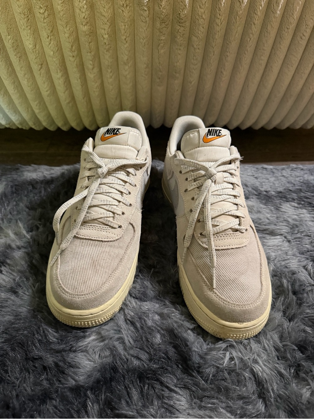 Nike Low-Top Canvas Sneakers in Beige with Orange Logo